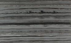 Dark gray stone with horizontal, wavy striations of light and dark.