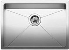 Stainless steel kitchen sink with angled drain lines.