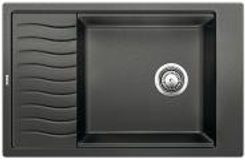 Black kitchen sink with built-in drainboard, stainless steel drain cover.