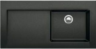 Black granite kitchen sink with one large and one smaller basin.