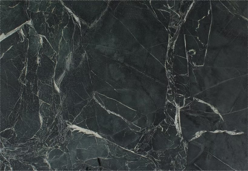 Dark green marble with white veining.