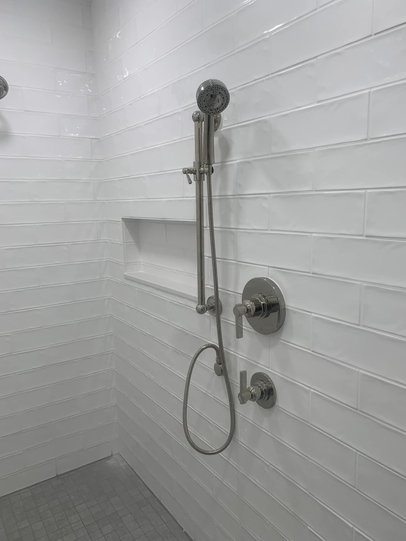 White tiled shower area