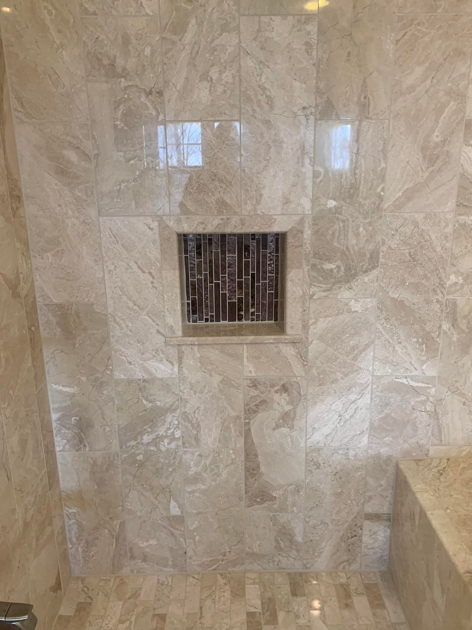 Recessed soap dish in tiled shower wall