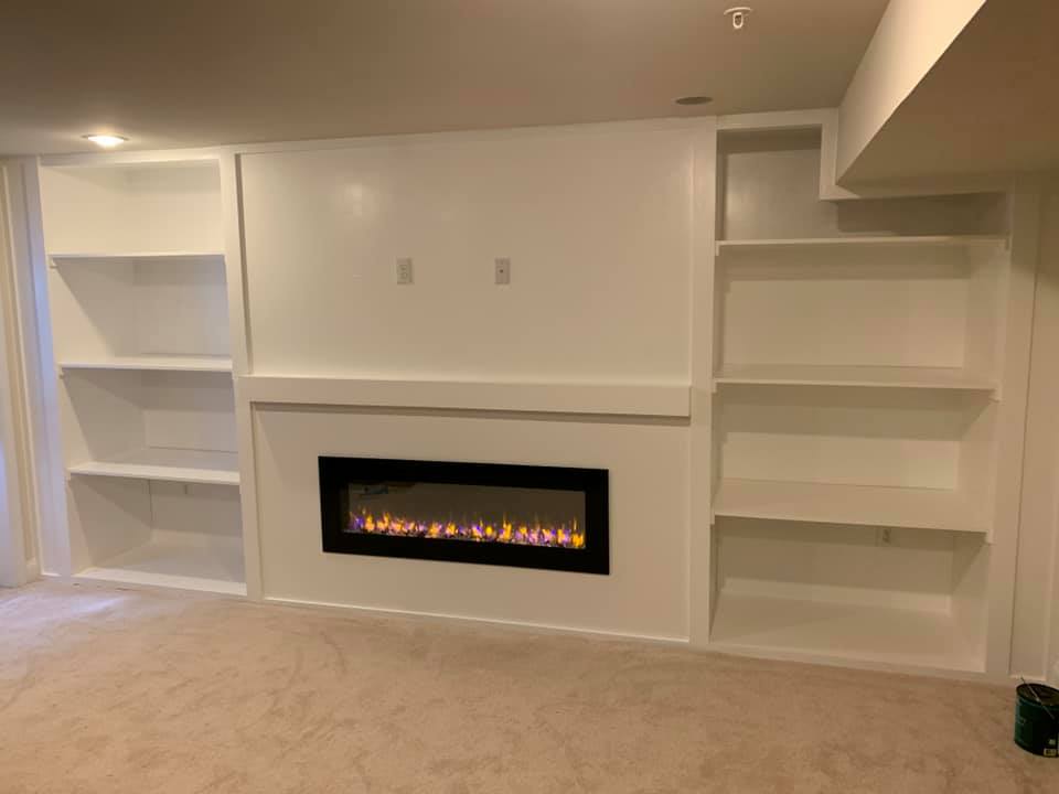 Empty shelves with fireplace