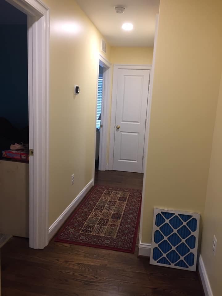 Cream colored wall and white door