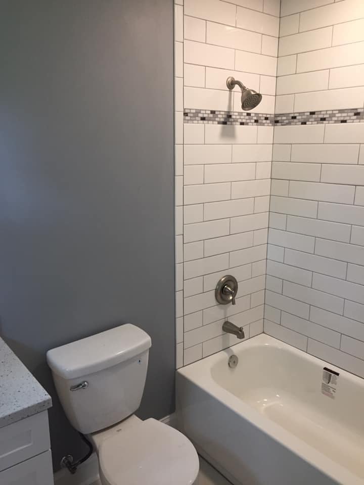 White tiled shower area