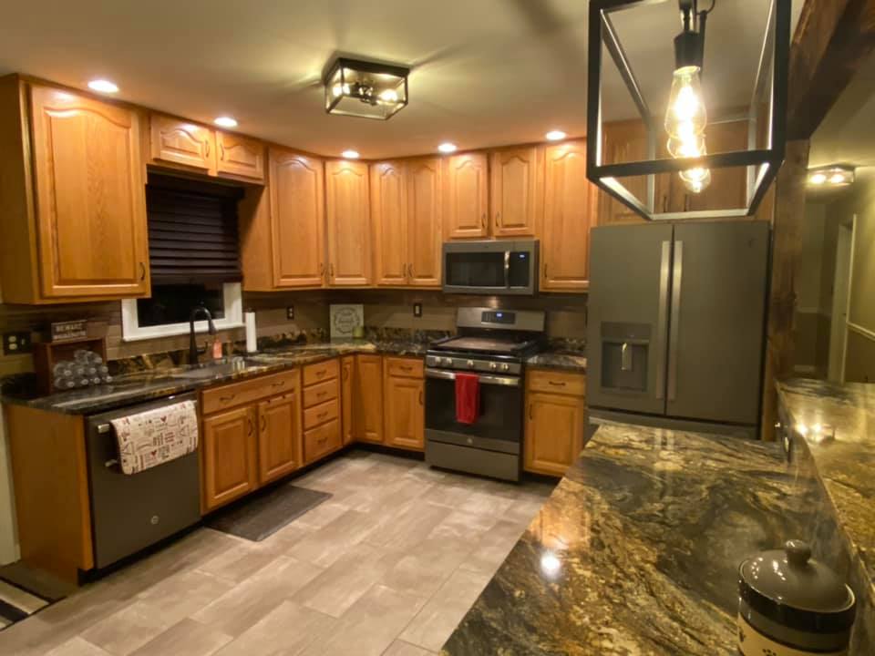 Kitchen with wooden brown colored cabinets