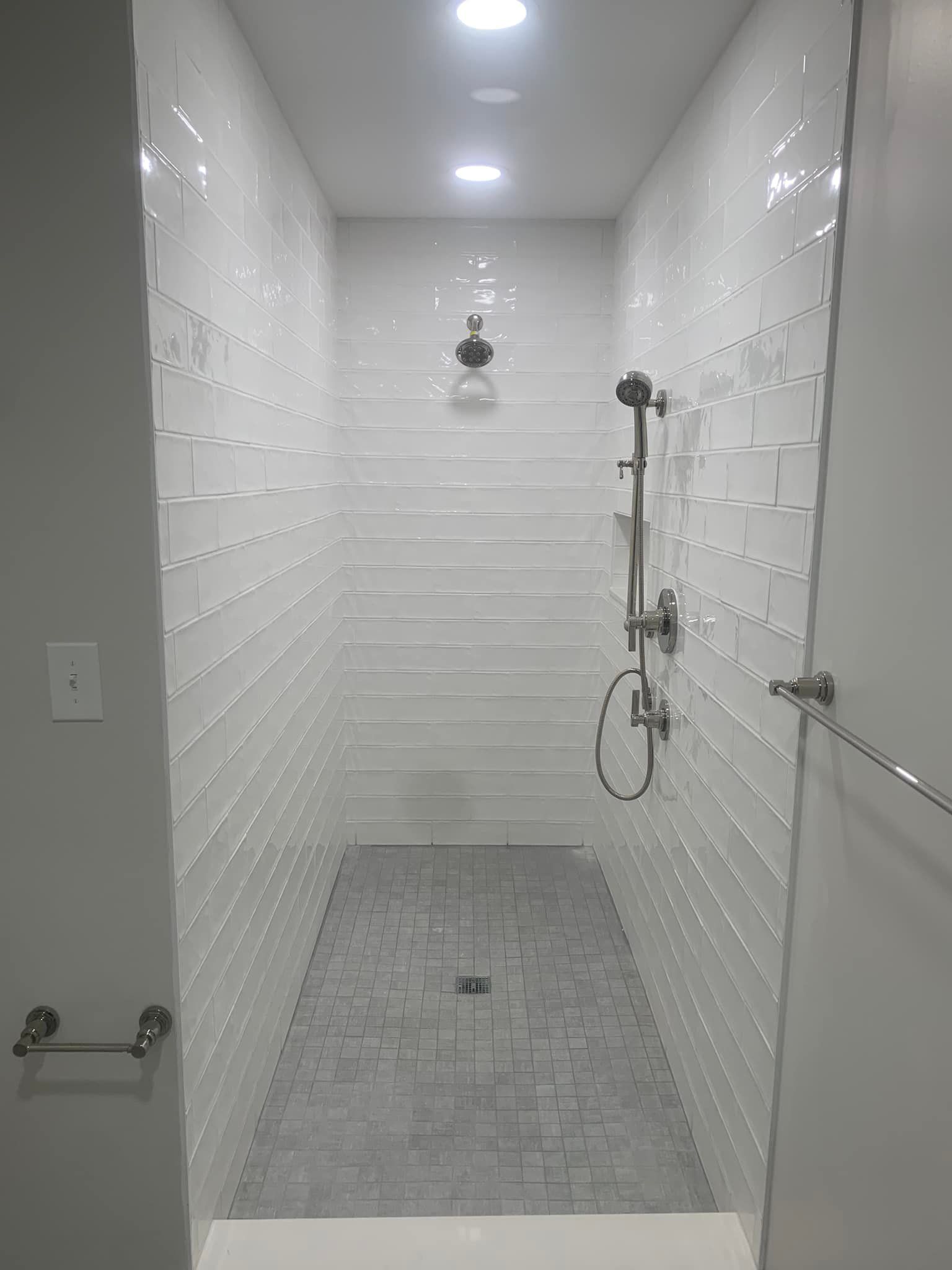 White tiled shower area