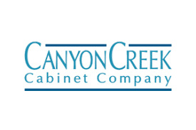 A canyon creek cabinet company logo on a white background
