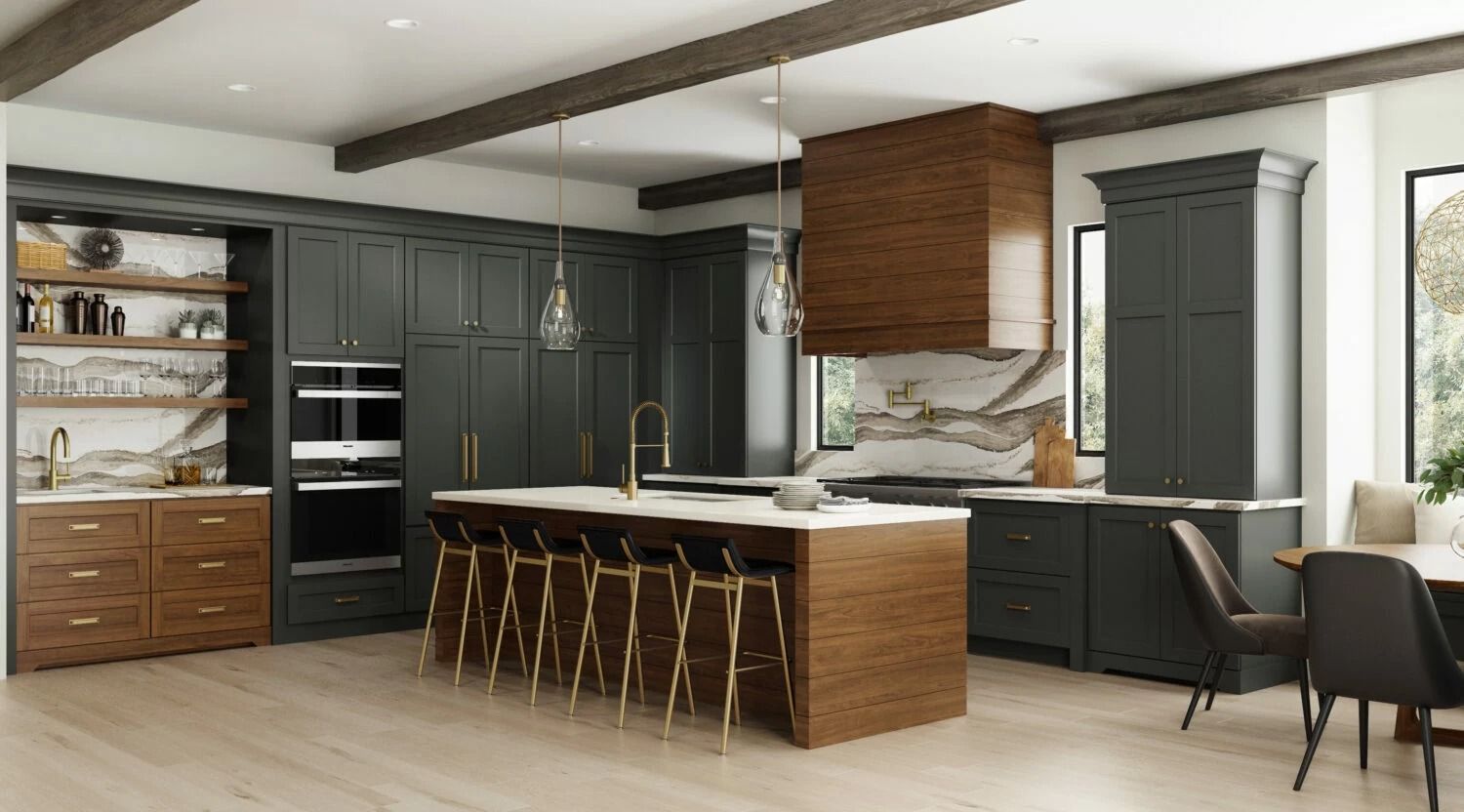 A kitchen with black cabinets and a large island in the middle.