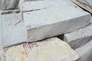 A pile of rocks sitting on top of each other on a table.