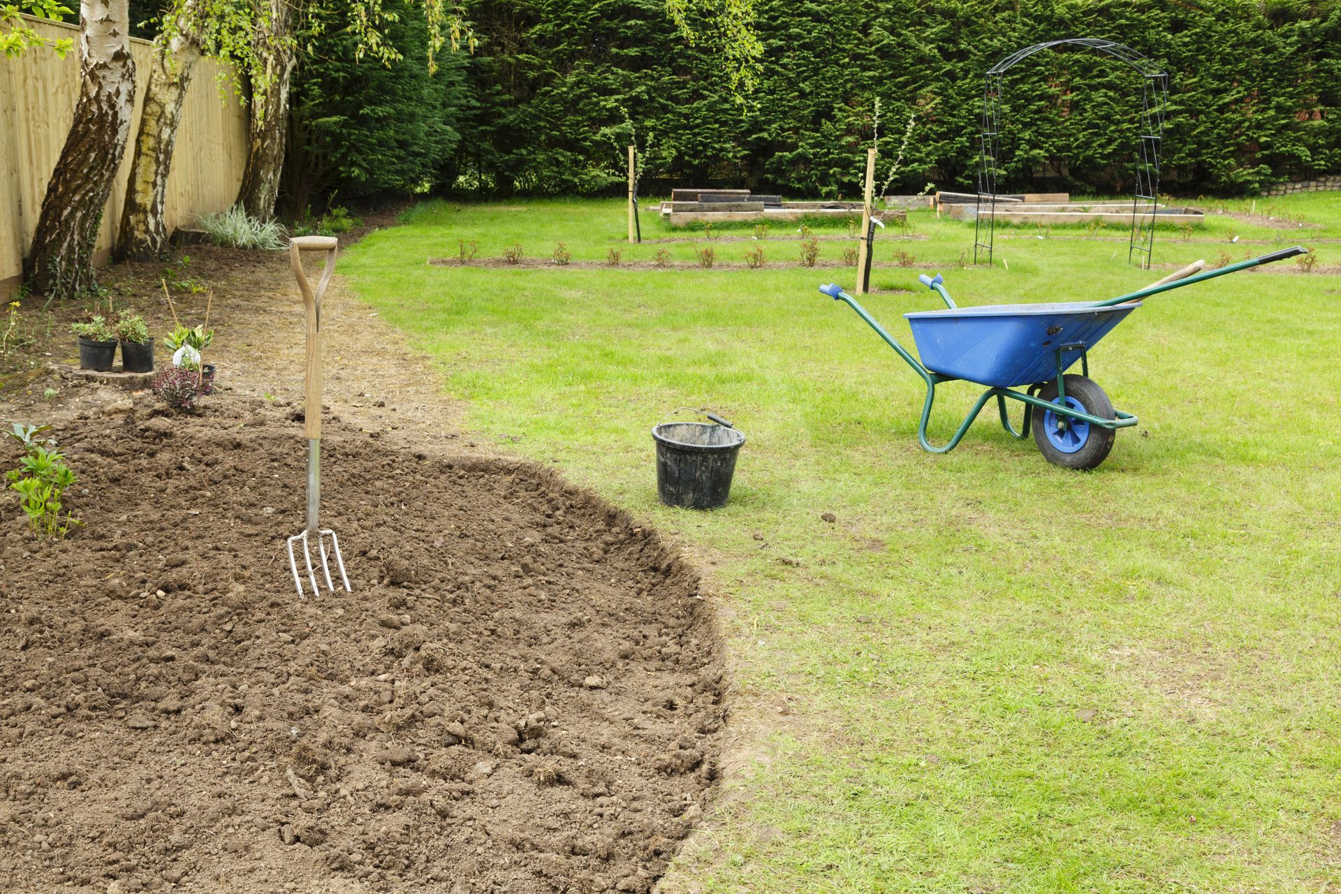 3 Ways Fresh Top Soil Revives Tired Flower Beds