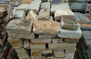 A pile of bricks stacked on top of each other.