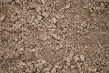 A close up of a pile of dirt and rocks.