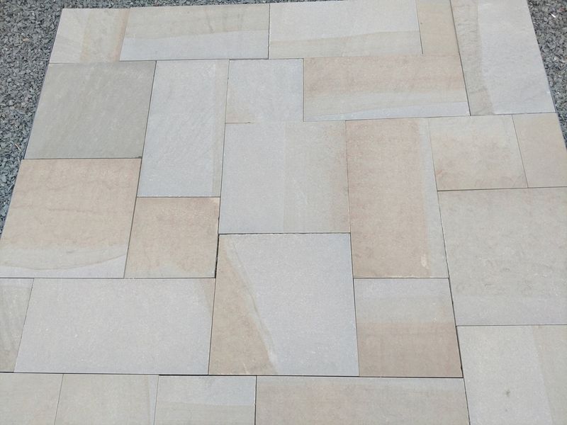 A tile floor with a pattern of squares on it