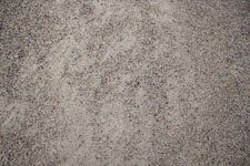 A close up of a gray carpet texture.