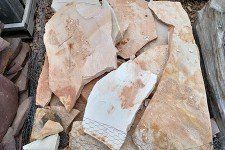 A pile of rocks sitting on top of each other on a table.