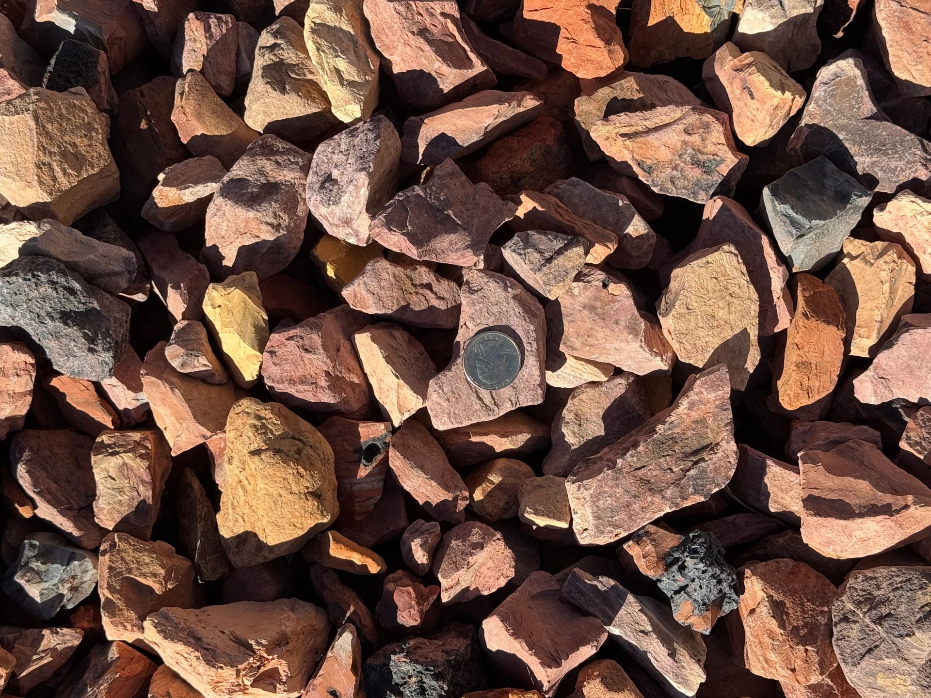 A pile of rocks sitting on top of each other on a table.