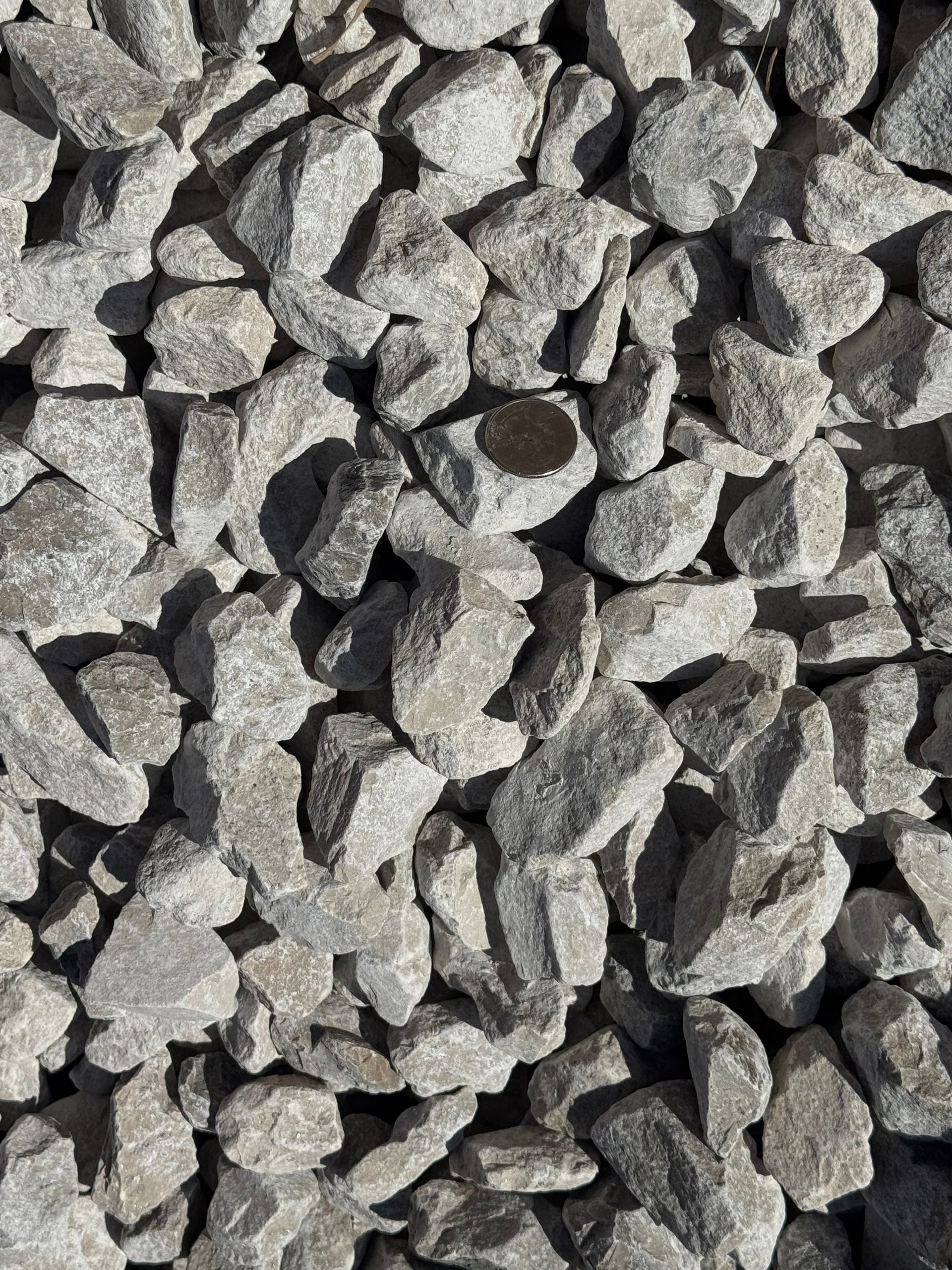 A pile of white rocks sitting on top of each other on a table.