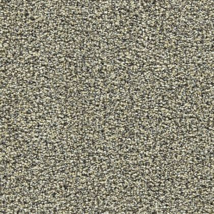 A close up of a carpet texture with a lot of small stones.