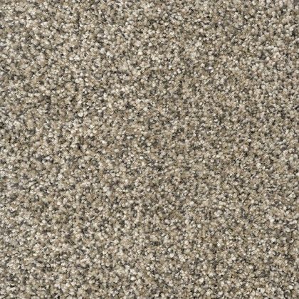 A close up of a carpet with a lot of small dots on it.