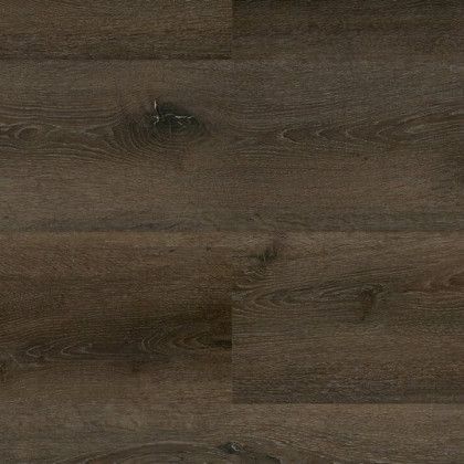 A close up of a dark brown wooden floor.