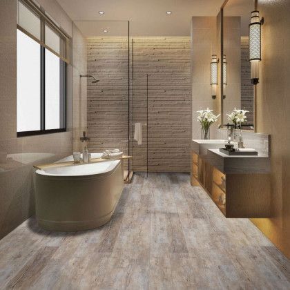 A bathroom with a tub , sinks , mirrors and a walk in shower.