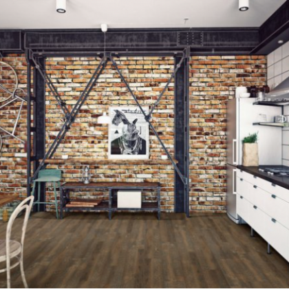 A kitchen with a picture of a rabbit on the wall
