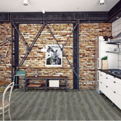 A kitchen with a picture of a rabbit on the wall