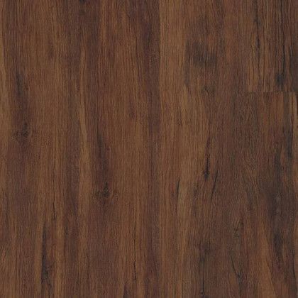 A close up of a brown wooden floor.