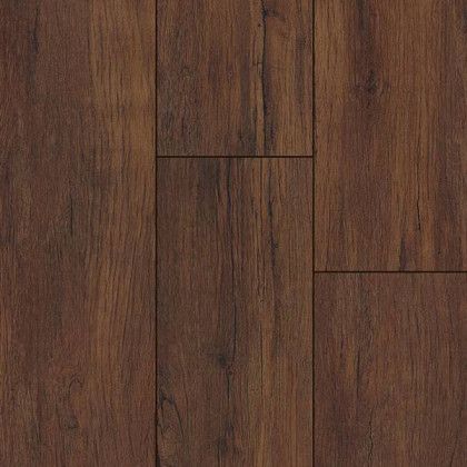 A close up of a dark brown wooden floor.