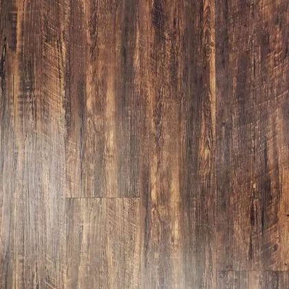 A close up of a wooden floor with a grainy texture.