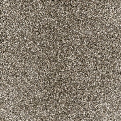 A close up of a piece of carpet with a grainy texture.