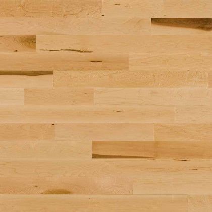 A close up of a wooden floor with a lot of grain.