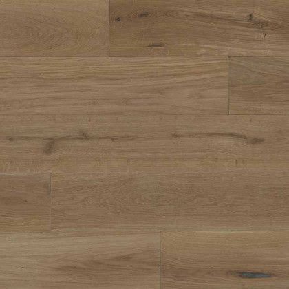 A close up of a wooden floor with a grain and texture.