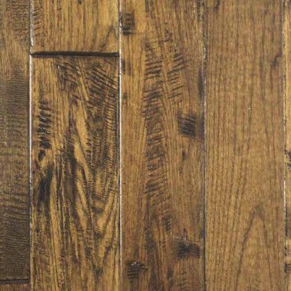 A close up of a wooden floor with a grain and texture.