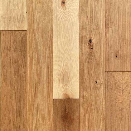 A close up of a wooden floor made of hardwood.