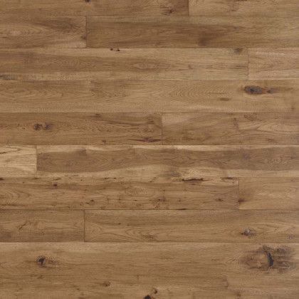 A close up of a wooden floor with a grain and texture.