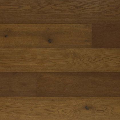 A close up of a wooden floor with a grain and texture.