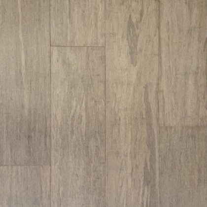 A close up of a wooden floor with a marble texture.