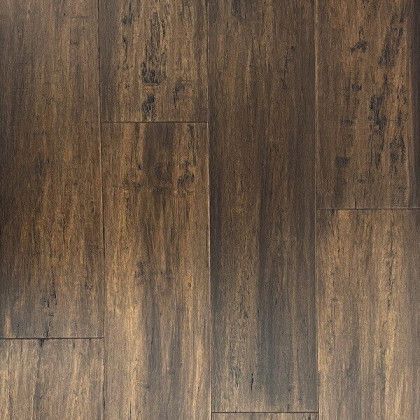 A close up of a wooden floor with a grainy texture.