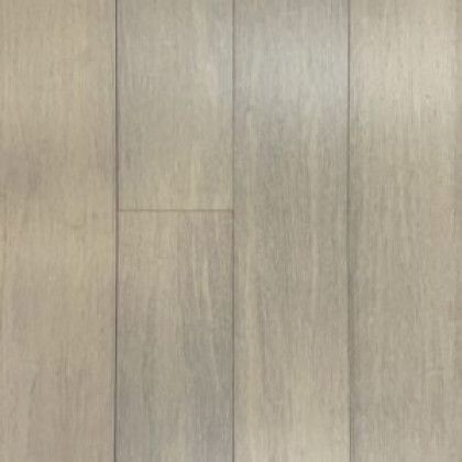 A close up of a wooden floor with a grainy texture.