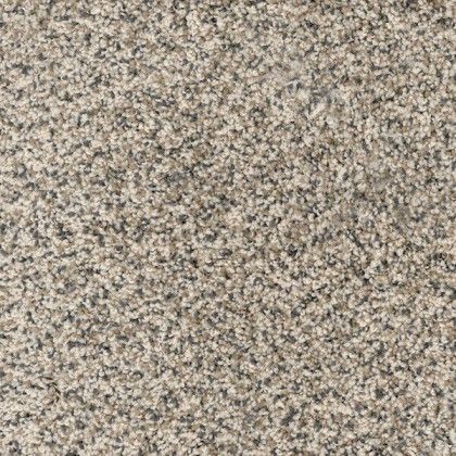 A close up of a carpet with a gray and white texture.