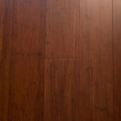 A close up of a wooden floor with a grainy texture.