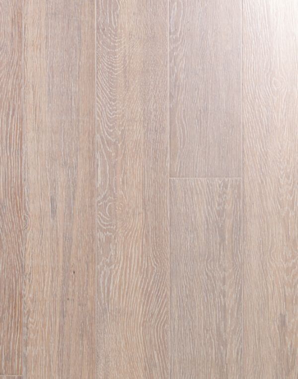 A close up of a wooden floor with a light shining on it.