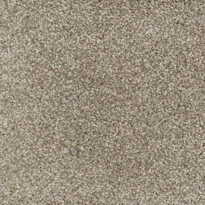A close up of a carpet with a lot of small stones on it.