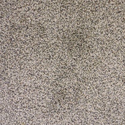 A close up of a gray carpet texture.