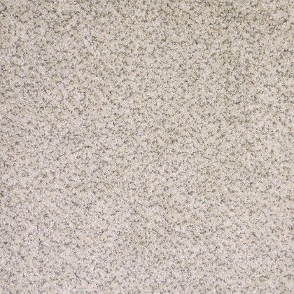 A close up of a white tile with a marble texture.