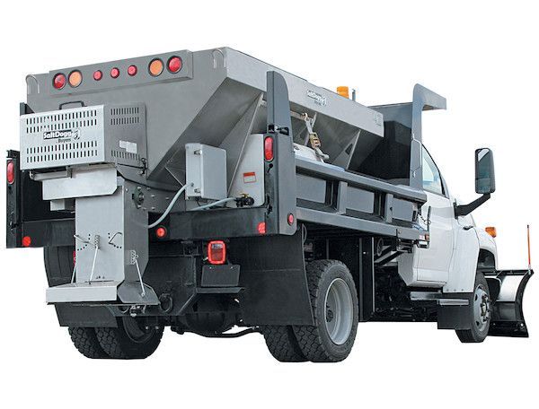 White snowplow truck with salt spreader, rear view.