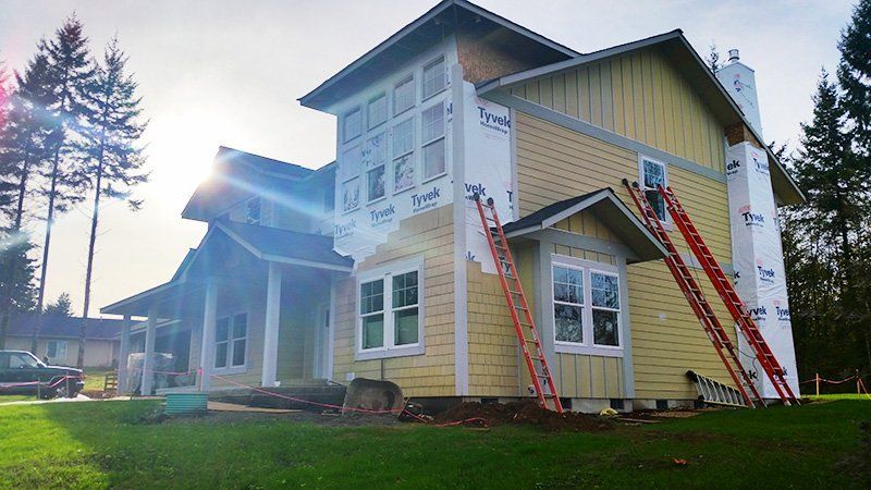 House with yellow siding